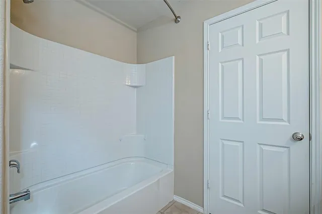 a bathroom with a bathtub