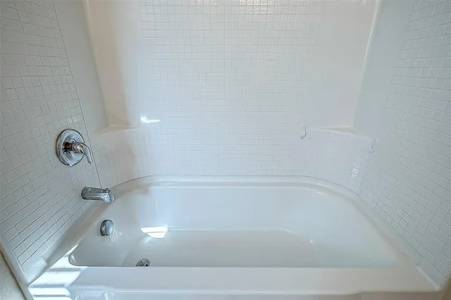 a bathroom with a bathtub