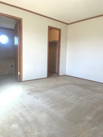 an empty room with windows