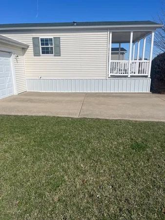 a view of backyard with deck