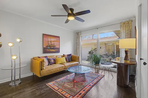a bedroom with furniture and a fireplace