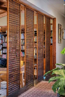 a view of a balcony with wooden floor