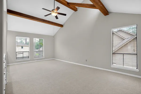 a bathroom with a sink vanity mirror and toilet