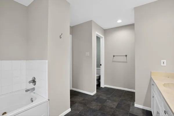 a view of two sink and a mirror