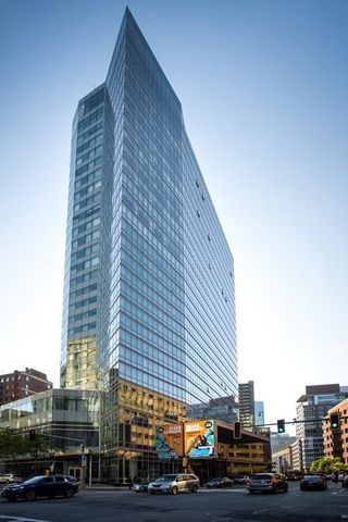 a room with gym equipment and a large window