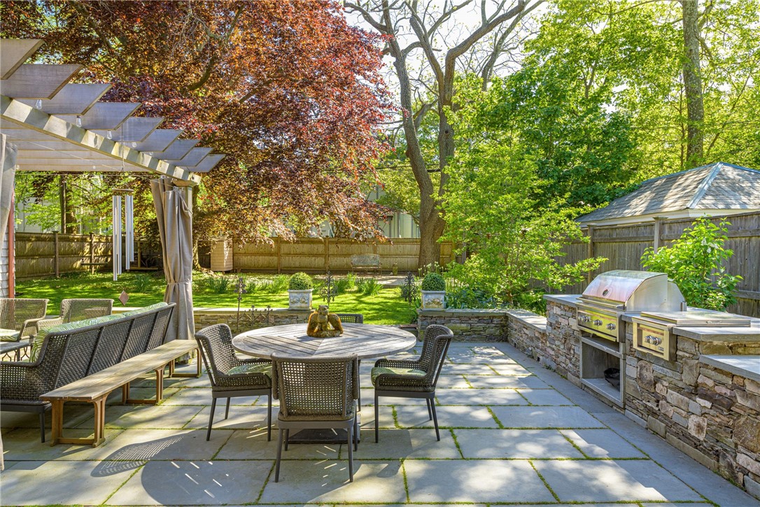 33 Everett Street Newport, RI 02840 - Photo 9 of 44 Walk out to glorious back yard, dining & living room with fireplace