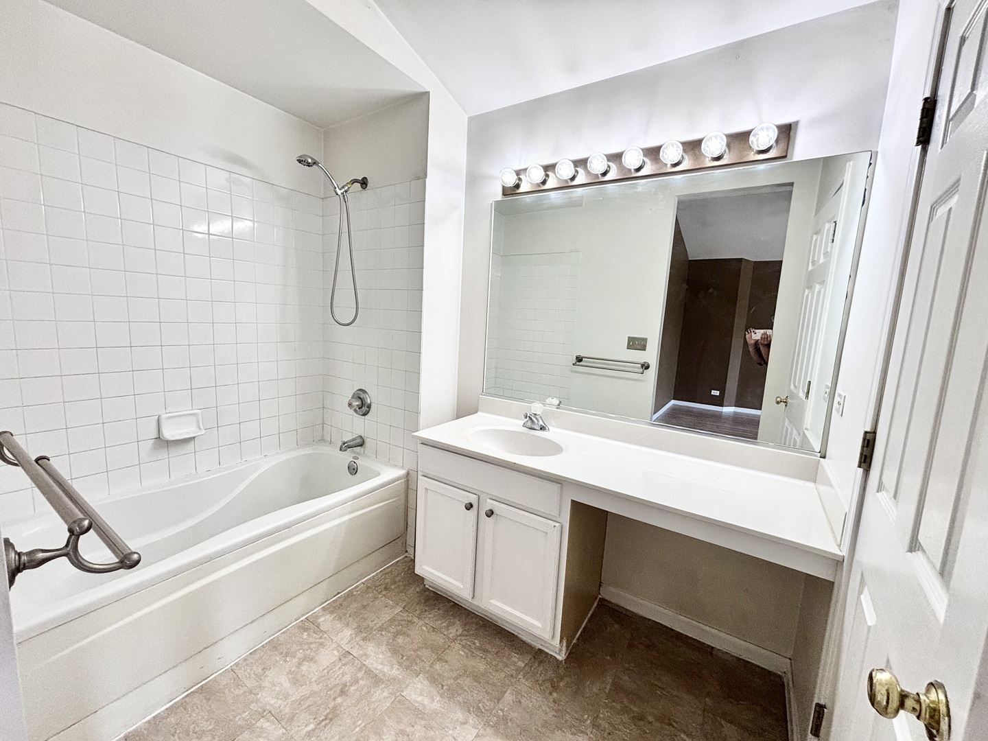2428 Reflections Drive Aurora, IL 60502 - Photo 5 of 15 a bathroom with a tub sink and mirror
