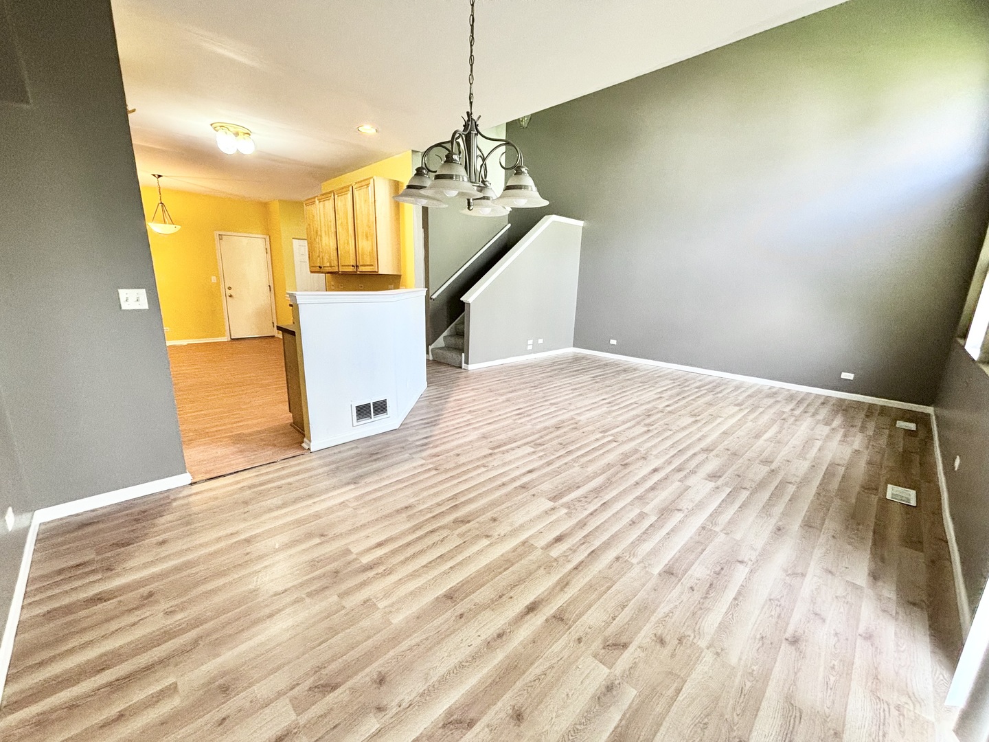 2428 Reflections Drive Aurora, IL 60502 - Photo 9 of 15 a view of a room with wooden floor