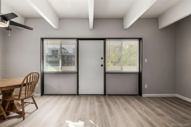 a view of a livingroom with furniture and window