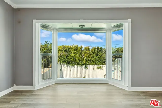 a bathroom with a double vanity sink and mirror
