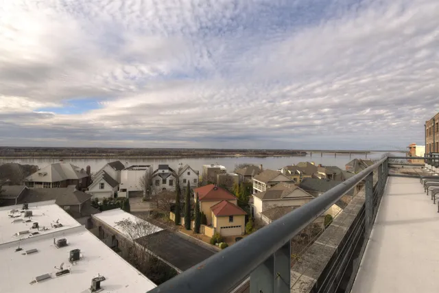 a view of a porch with hardwood