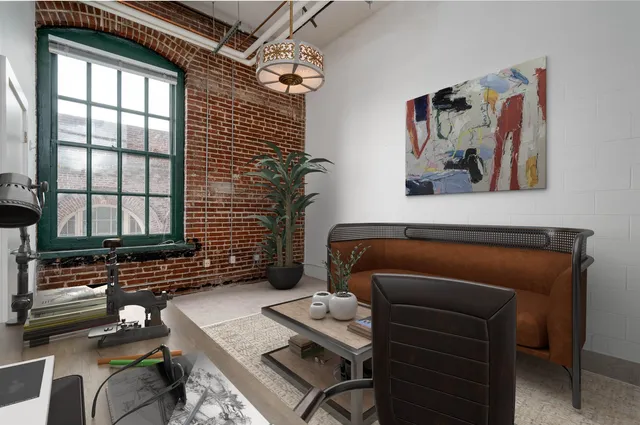 a bathroom with a toilet sink vanity and mirror