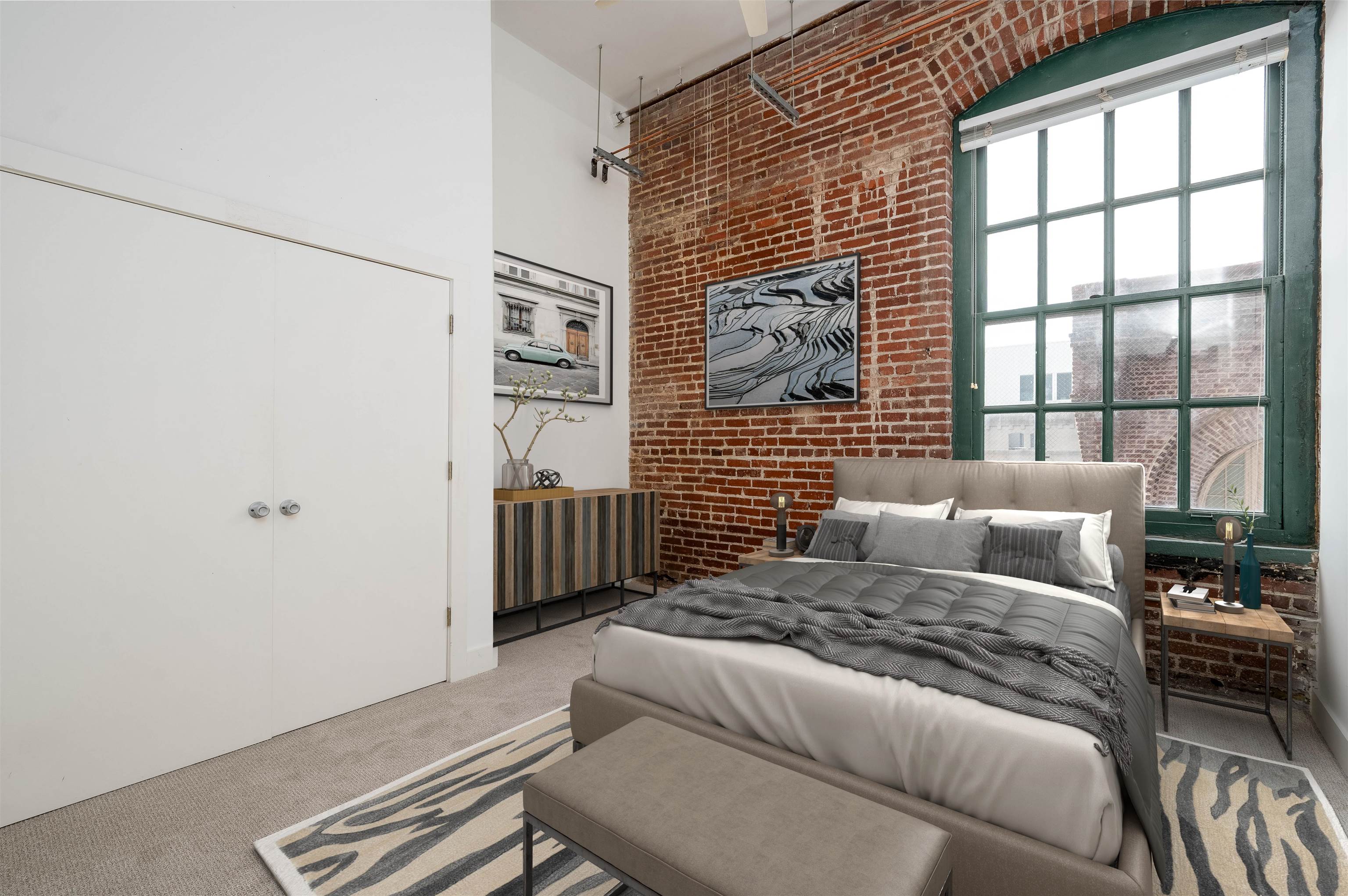 505 Tennessee Street, Unit 428 Memphis, TN 38103 - Photo 7 of 29 a bedroom with a bed and a window