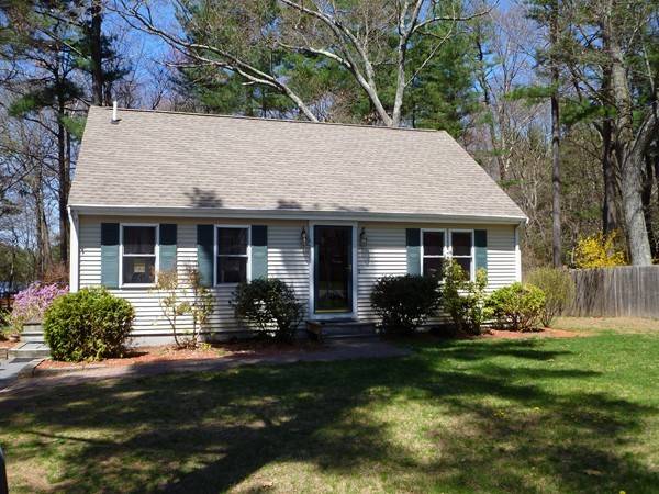 47 Evergreen Road Norton, MA 02766 - Photo 1 of 17 a front view of house with a garden and porch