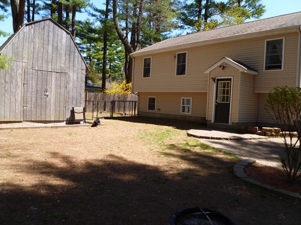 47 Evergreen Road Norton, MA 02766 - Photo 14 of 17 a view of a house with a yard