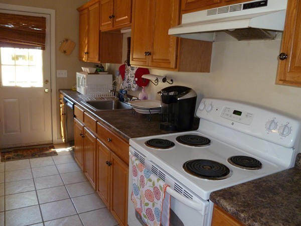 47 Evergreen Road Norton, MA 02766 - Photo 10 of 17 a kitchen with a stove and a sink