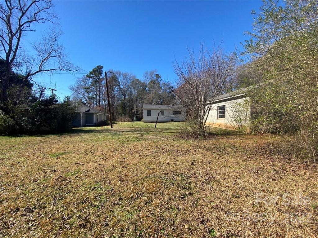 1436 Banks Road Fort Mill, SC 29715 - Photo 11 of 19 a view of a backyard with large trees