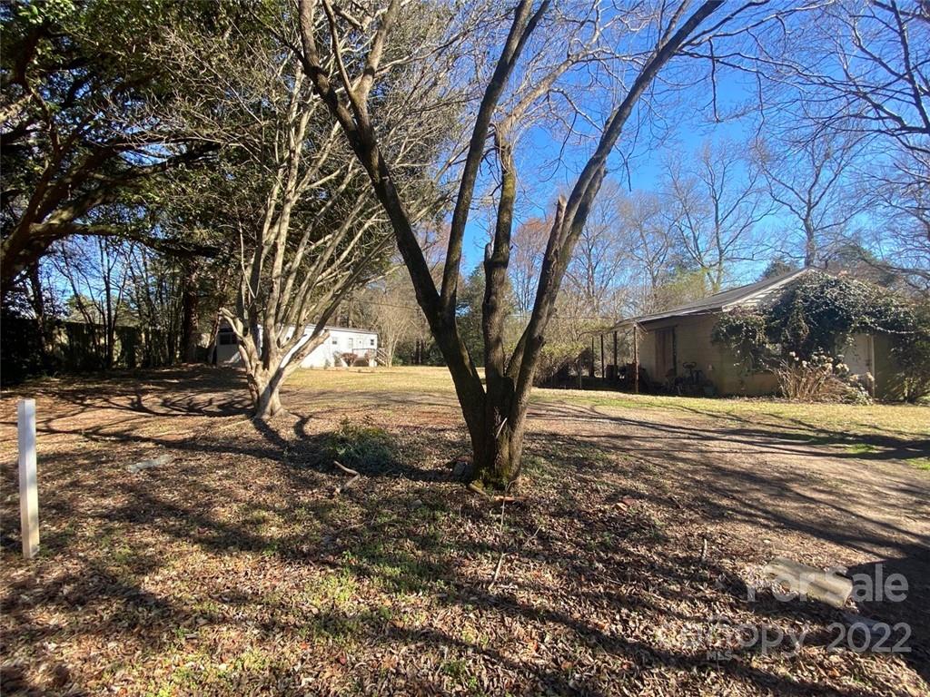 1436 Banks Road Fort Mill, SC 29715 - Photo 9 of 19 a view of a yard covered with snow in front of house