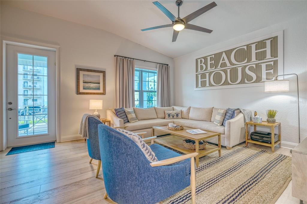 13511 Gulf Boulevard Madeira Beach, FL 33708 - Photo 8 of 30 a living room with furniture and wooden floor