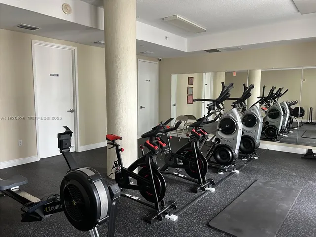 a view of a room with gym equipment