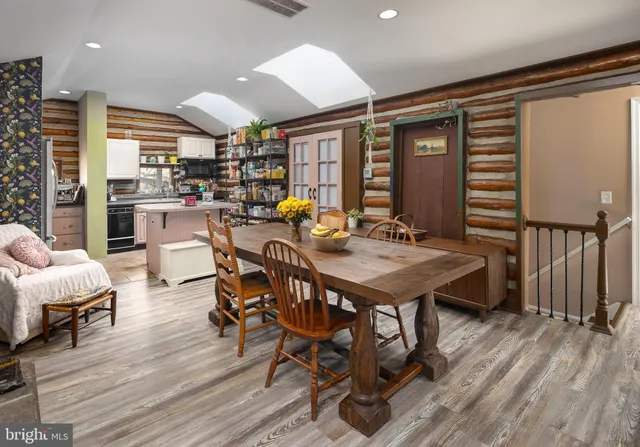 a kitchen with stainless steel appliances granite countertop a stove and a sink