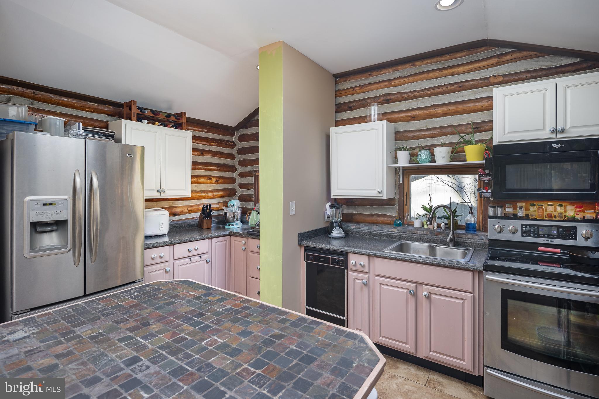 11999 Manning Road Manassas, VA 20112 - Photo 15 of 76 a kitchen with stainless steel appliances a stove sink and refrigerator