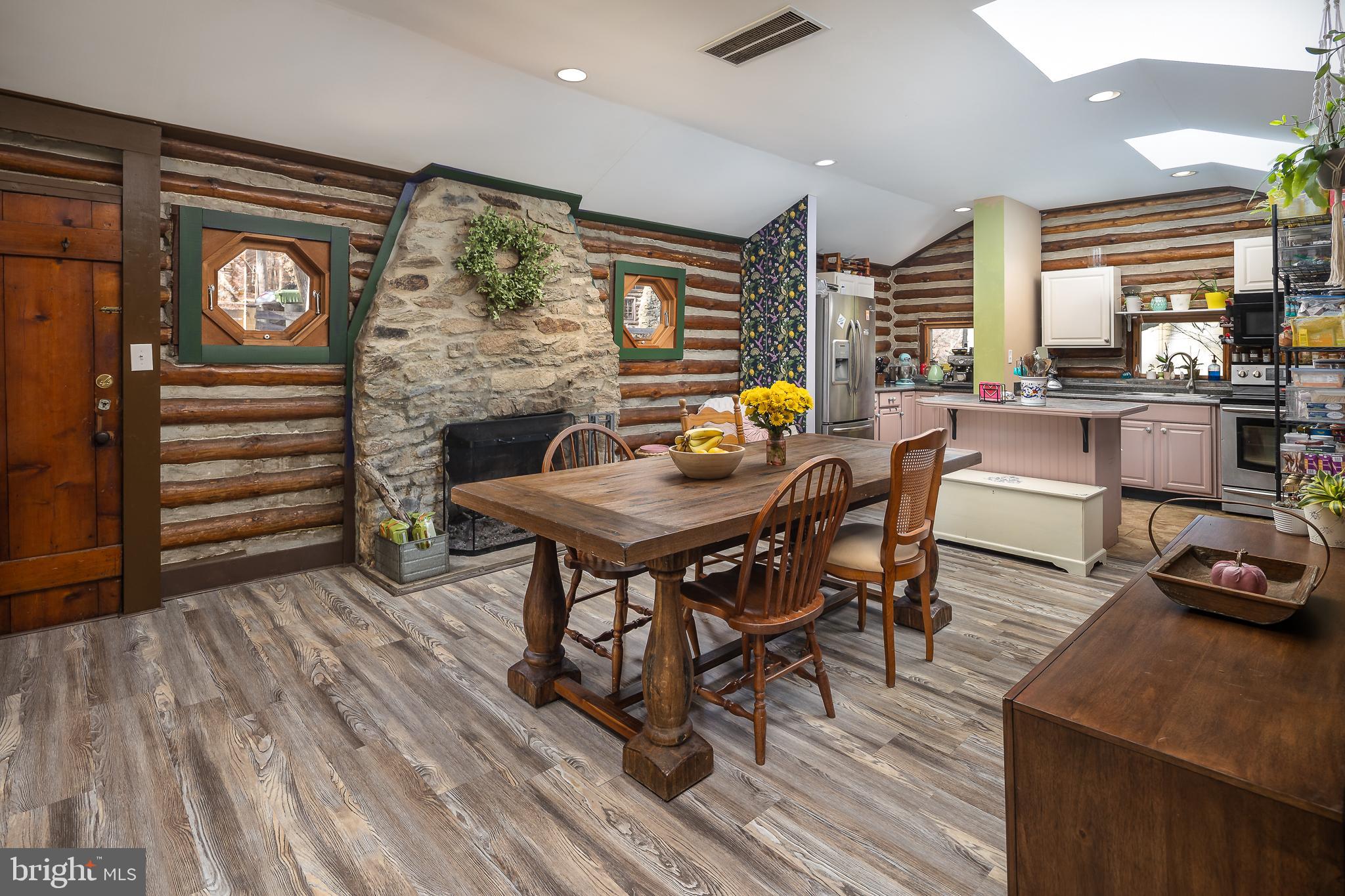 11999 Manning Road Manassas, VA 20112 - Photo 17 of 76 a dining room with furniture and wooden floor