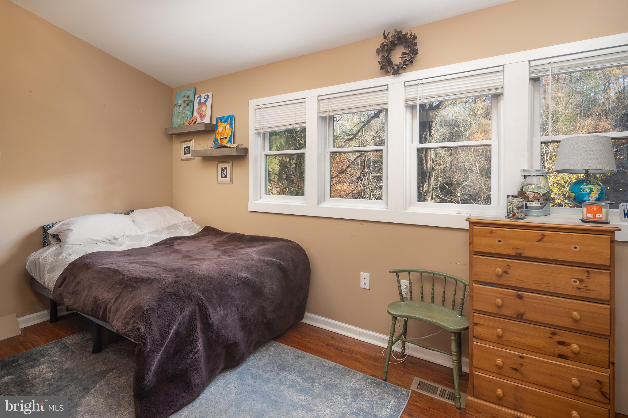 11999 Manning Road Manassas, VA 20112 - Photo 19 of 76 a bedroom with a bed and a window