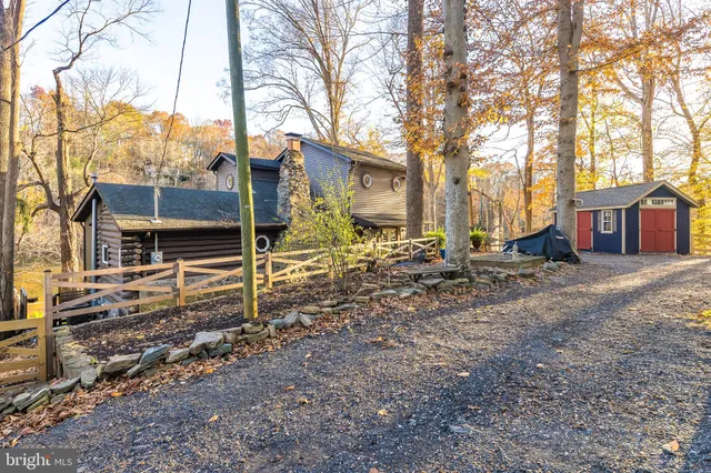 a row of houses on the side of street