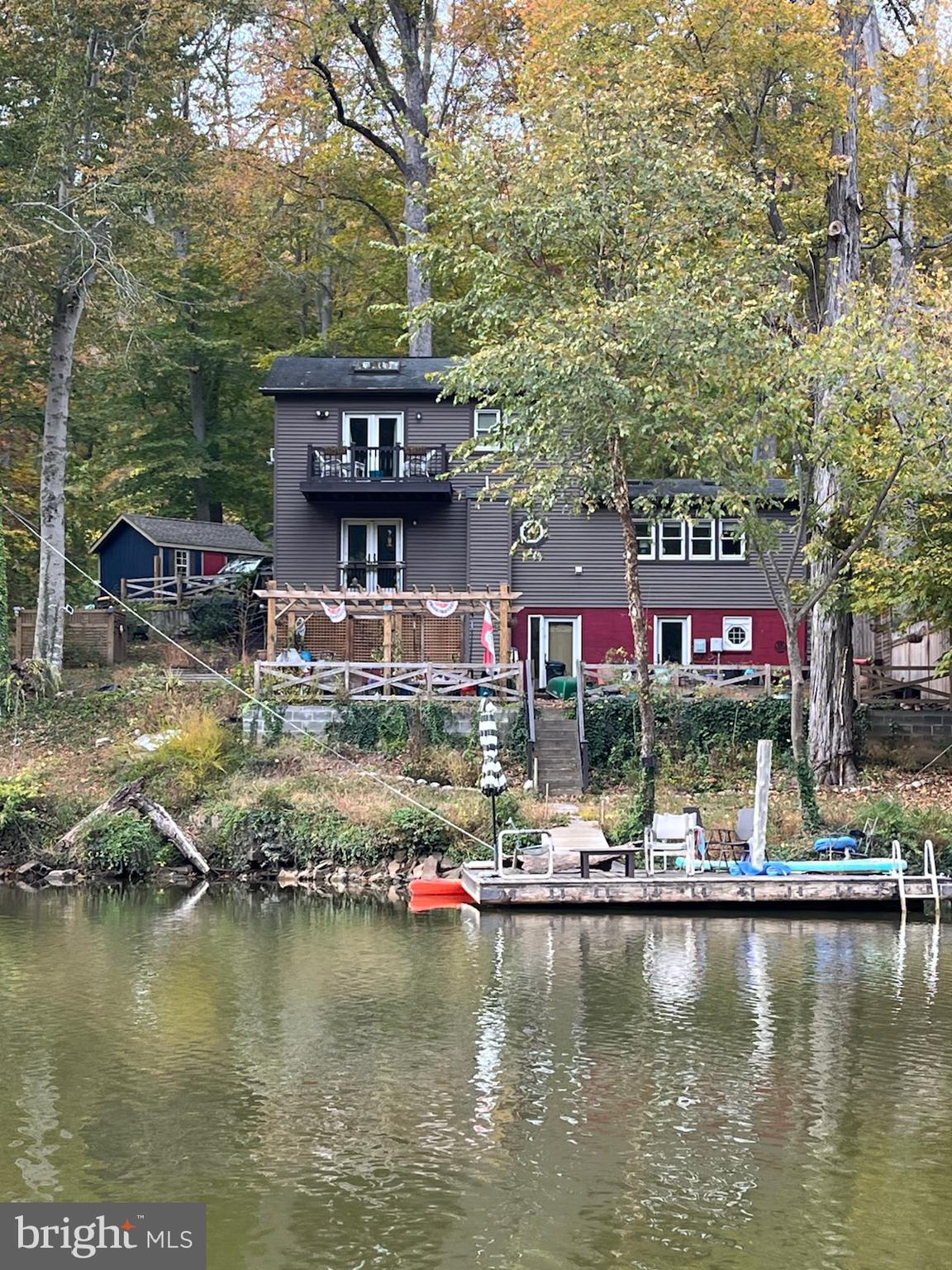 11999 Manning Road Manassas, VA 20112 - Photo 37 of 76 a view of a building with swimming pool and a yard