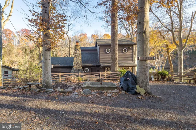 a view of a chairs and table in the yard