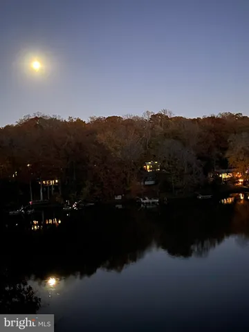 a view of a chairs and tables in patio