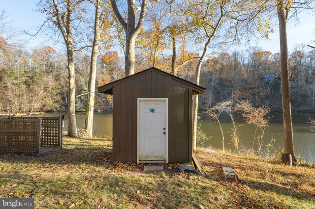a house with trees in the background