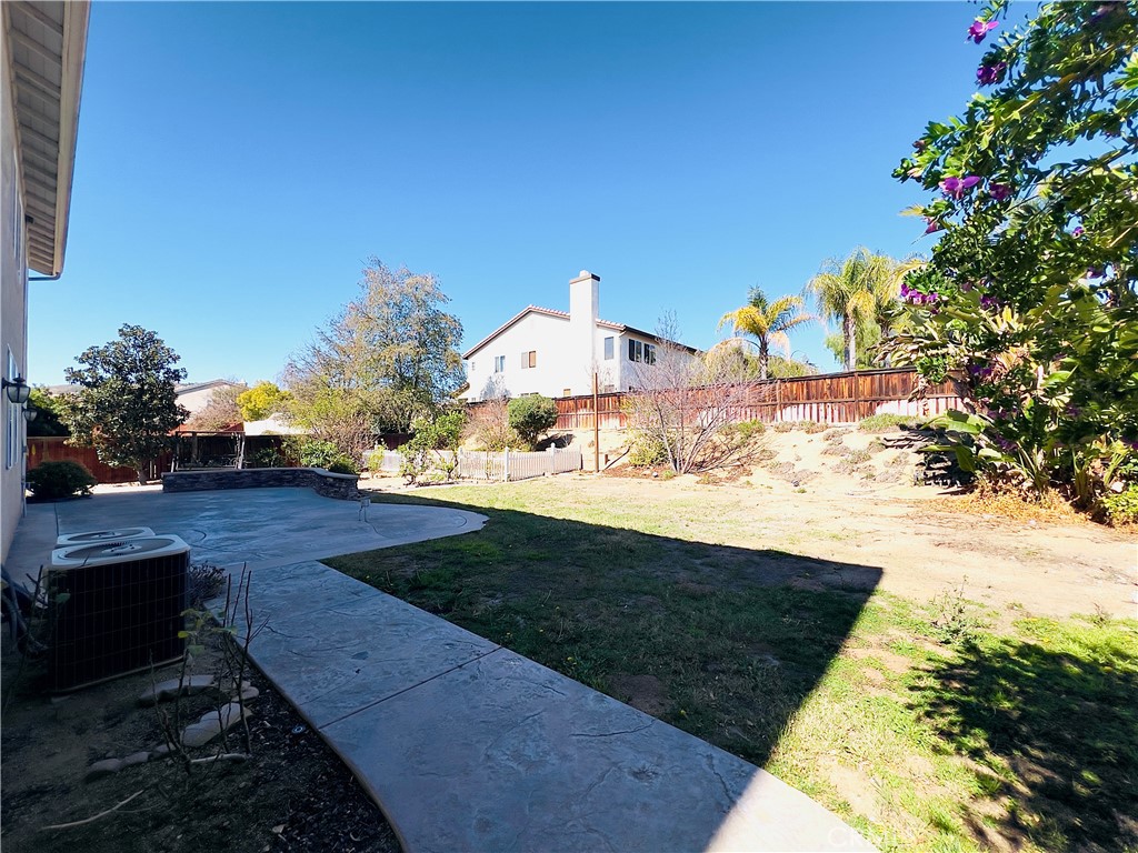 17231 Greentree Drive Riverside, CA 92503 - Photo 37 of 42 a view of a yard with an outdoor seating