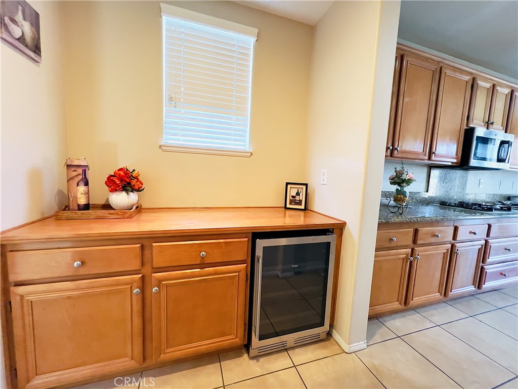 17231 Greentree Drive Riverside, CA 92503 - Photo 8 of 42 a kitchen with stainless steel appliances granite countertop a sink and cabinets