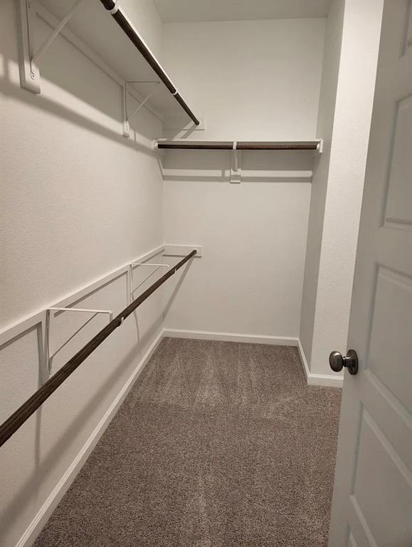 2043 Atlantic Avenue Anna, TX 75409 - Photo 17 of 25 a view of a room with racks on the wall