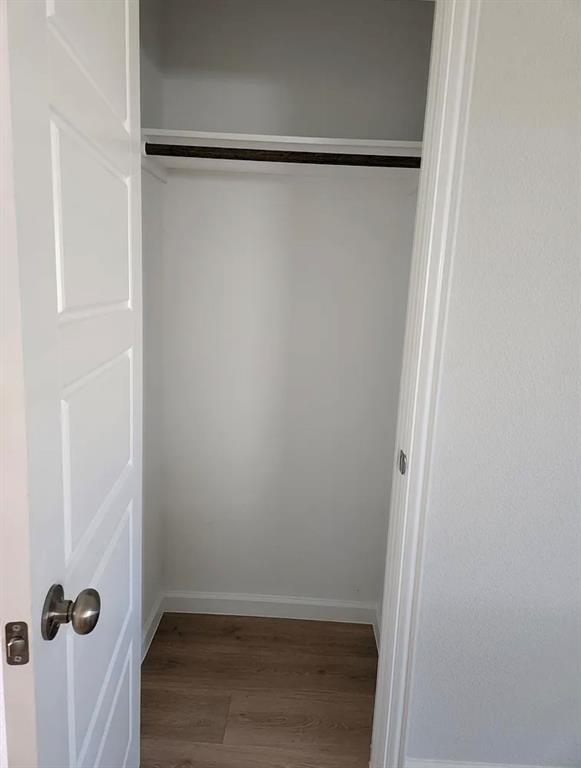 2043 Atlantic Avenue Anna, TX 75409 - Photo 20 of 25 a view of a room with wooden floor