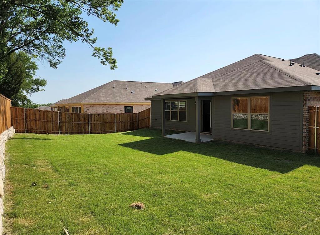 2043 Atlantic Avenue Anna, TX 75409 - Photo 25 of 25 a view of a house with a yard