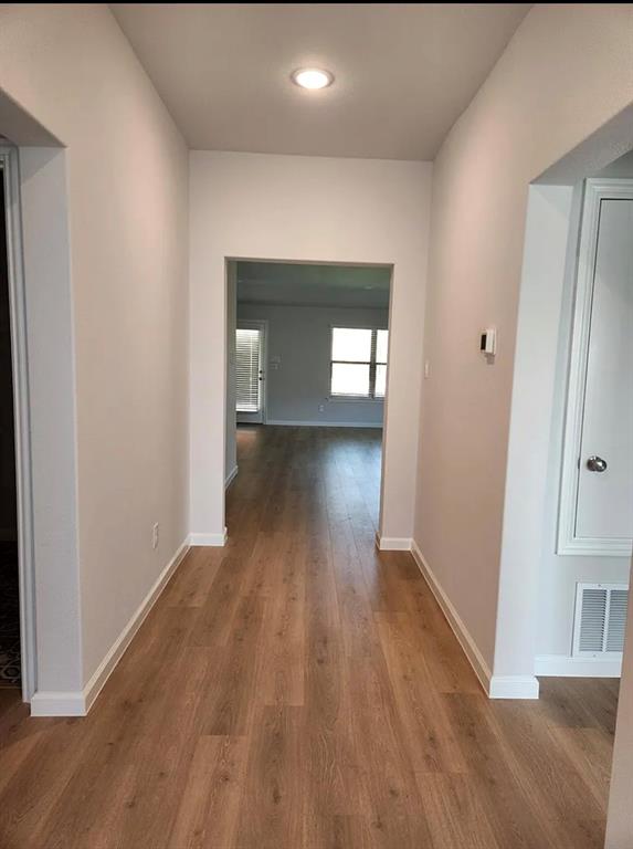 2043 Atlantic Avenue Anna, TX 75409 - Photo 3 of 25 a view of empty room with wooden floor