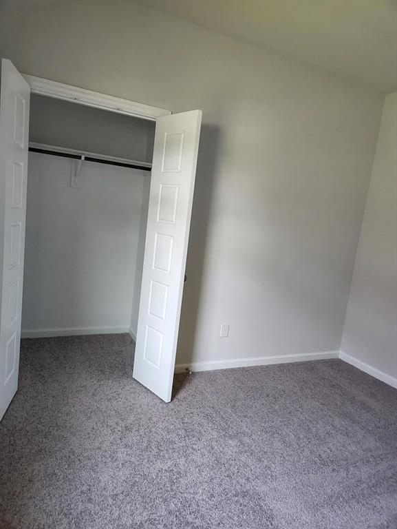 2043 Atlantic Avenue Anna, TX 75409 - Photo 6 of 25 an empty room with a door