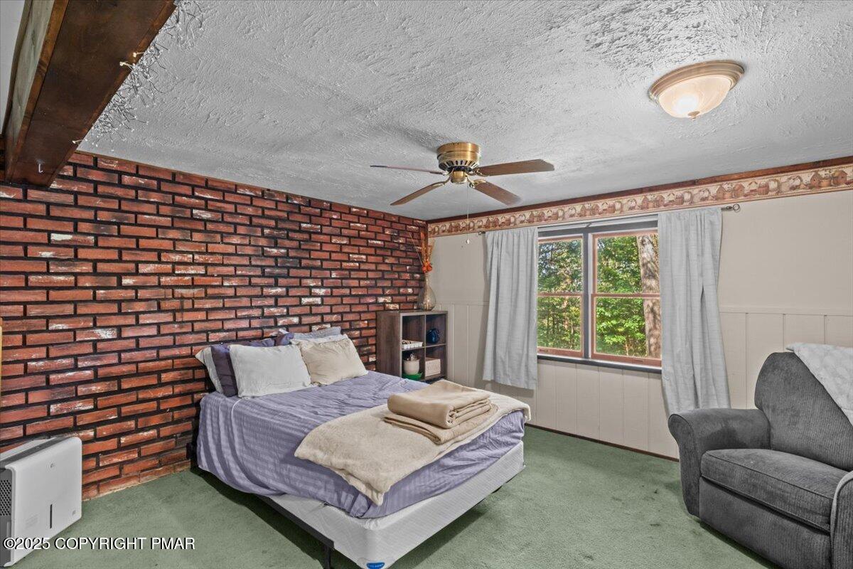 157 Viewtop Road Palmerton, PA 18071 - Photo 19 of 22 a bedroom with a bed and wooden floor