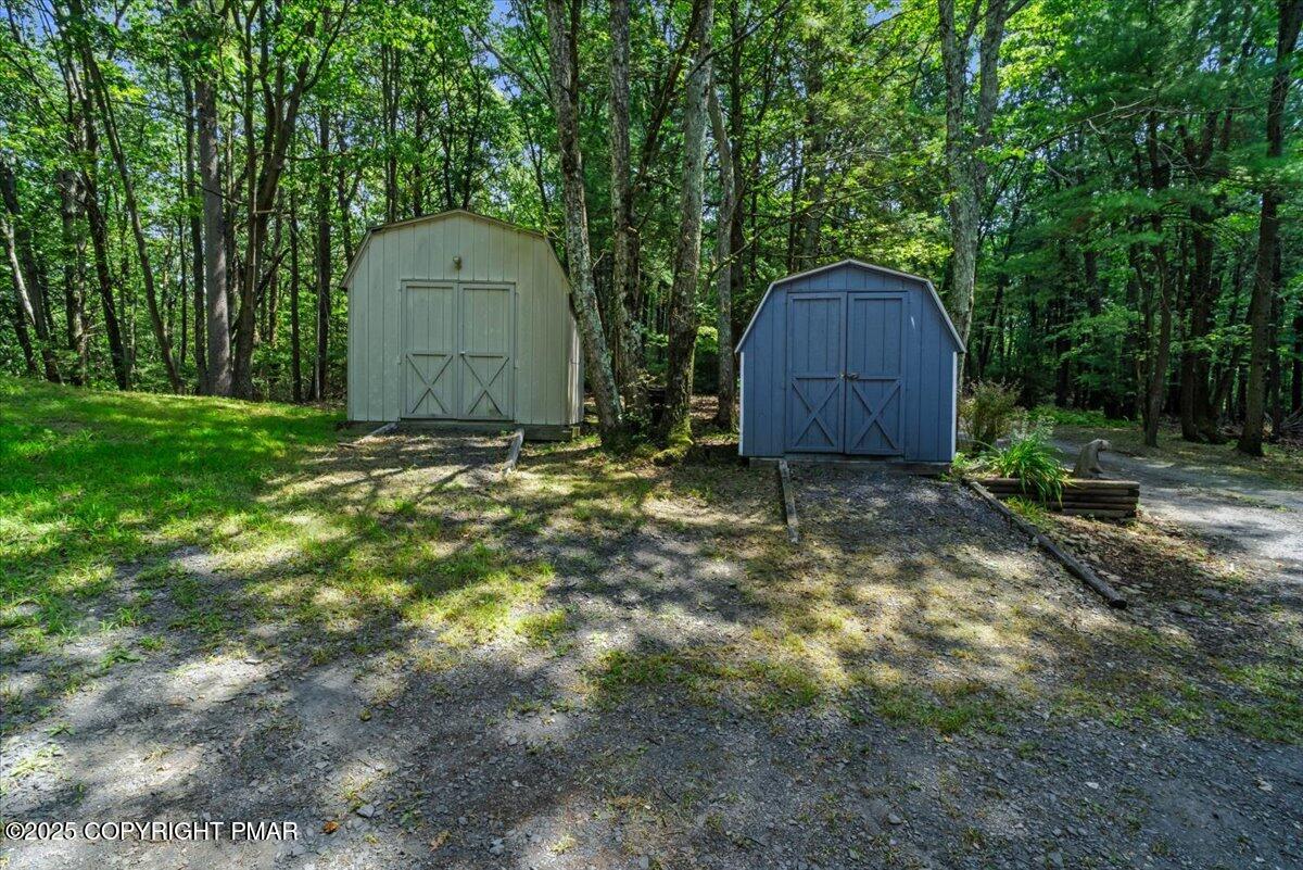 157 Viewtop Road Palmerton, PA 18071 - Photo 22 of 22 a wooden fence with trees in the background