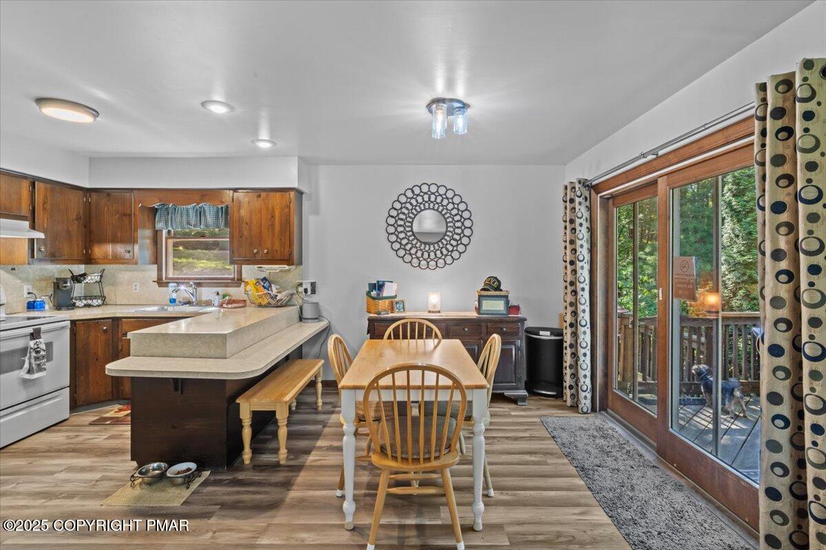 157 Viewtop Road Palmerton, PA 18071 - Photo 5 of 22 a view of a kitchen with kitchen island granite countertop a sink and a refrigerator