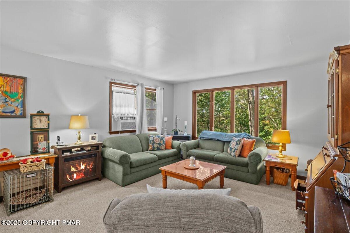 157 Viewtop Road Palmerton, PA 18071 - Photo 8 of 22 a living room with furniture and a large window
