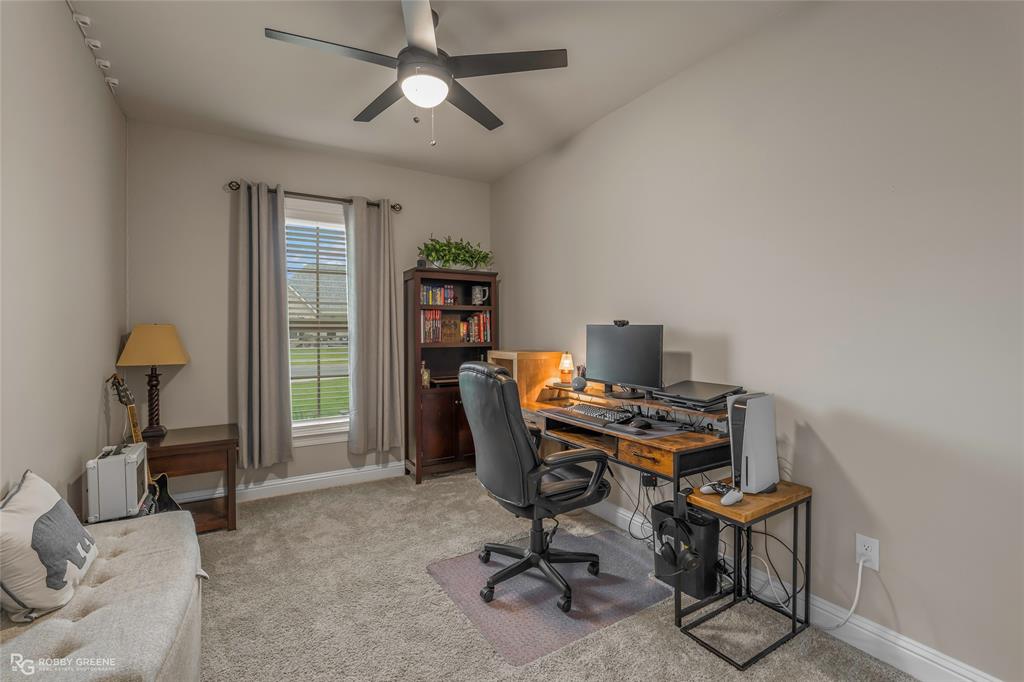 122 Brimestone Loop Benton, LA 71006 - Photo 23 of 33 a view of a workspace with furniture and a window
