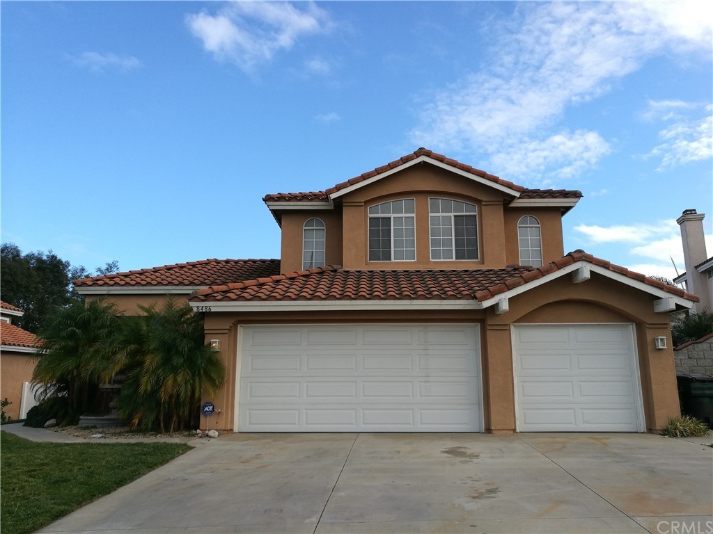 8486 Manuel Road Riverside, CA 92508 - Photo 1 of 1 a house that has a lot of windows on it