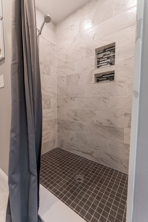 38 Cherry Street, Unit B Hudson, MA 01749 - Photo 25 of 33 a bathroom with a shower