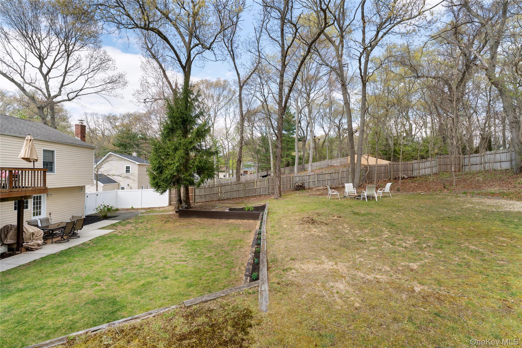 591 Meadow Road Kings Park, NY 11754 - Photo 15 of 50 a view of yard with tree