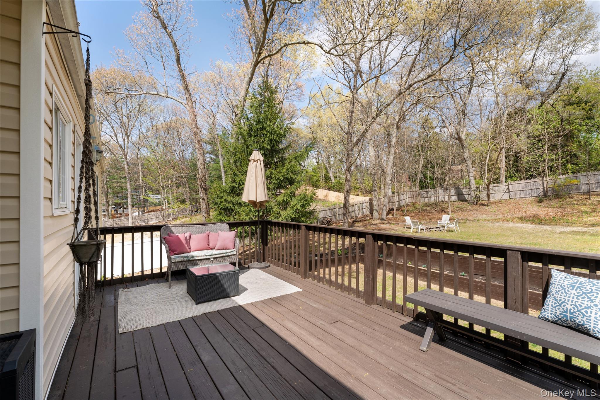 591 Meadow Road Kings Park, NY 11754 - Photo 16 of 50 a view of a balcony with wooden floor
