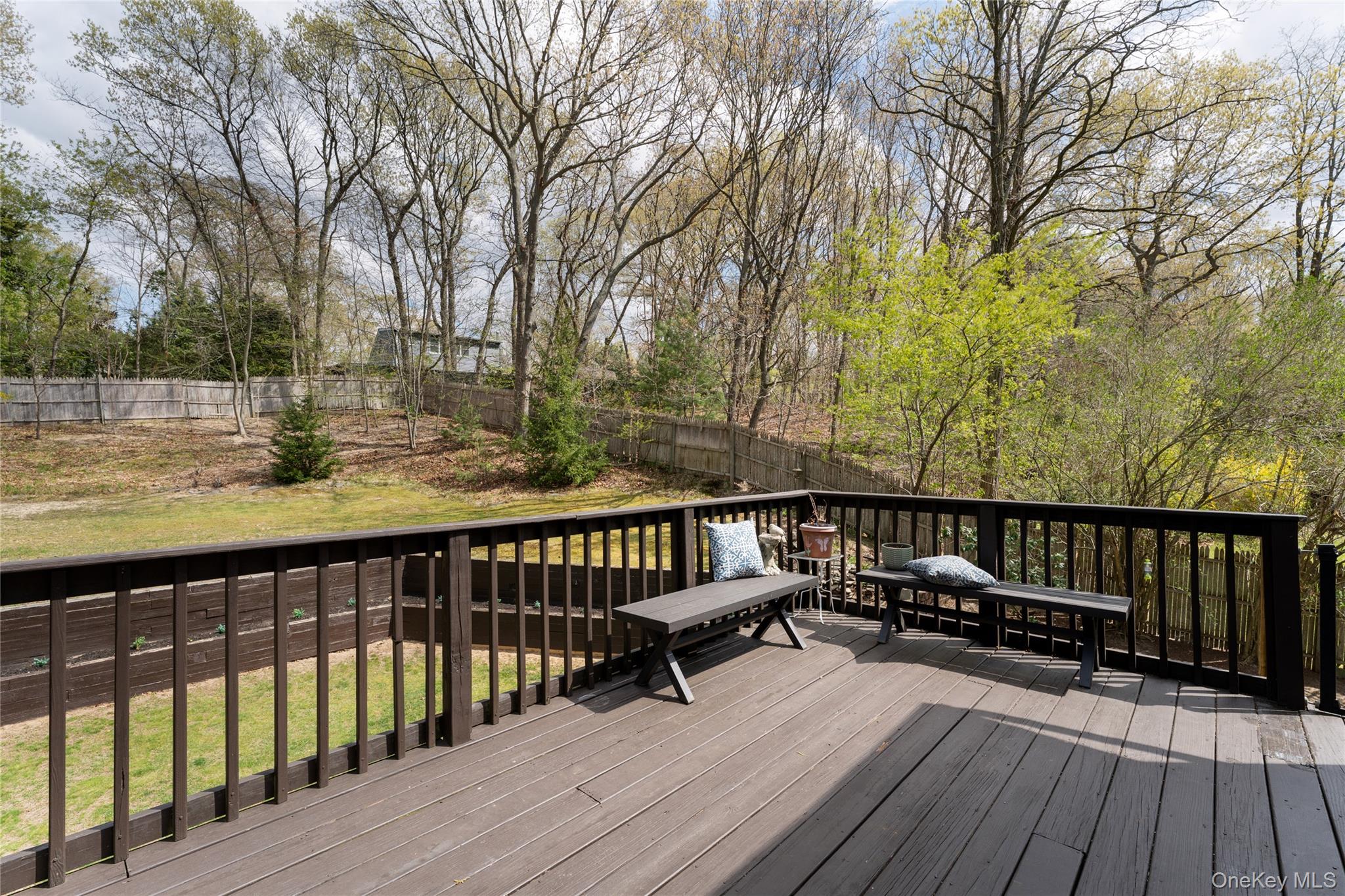591 Meadow Road Kings Park, NY 11754 - Photo 17 of 50 a view of balcony with wooden floor and outdoor seating